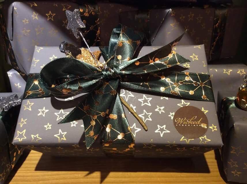 We are thoroughly enjoying hand picking our finest 'Wicked' chocolates for you and yours, delicately wrapping them in our new festive paper and adorning them with little touches we adore - we hope you will love them too!