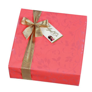 Splatter design gift wrapped ballotin of assorted Belgian chocolates